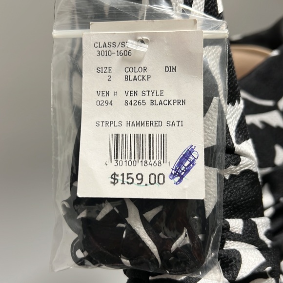 David’s Bridal strapless (built in cups) and straps included. - Picture 5 of 5